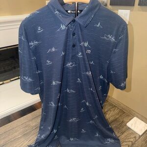 Travis Mathew Navy Polo with Nautical Print